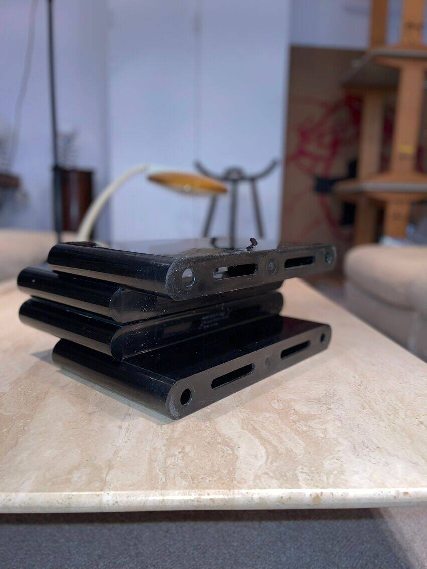 Black “Kartell” magazine rack by Giotto Stoppino, Italy 1970
