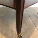 Two-level table in mahogany and brass