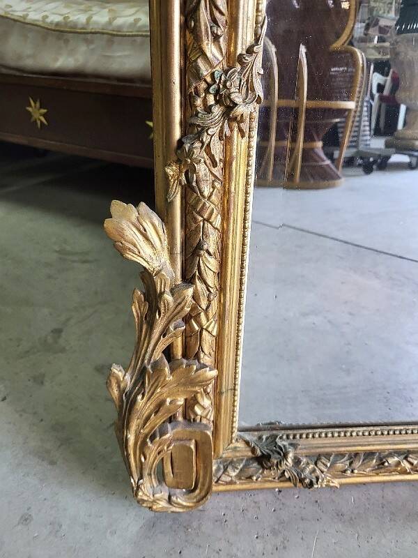 Large Louis XV gilded shell mirror from the 19th century