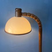 Mid-century floor lamp in brown wood by Steinhauer with an acrylic glass shade.