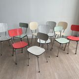 10 mismatched multicolored Formica chairs 60s