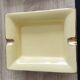Cendrier vintage fine porcelaine jaune et doré.