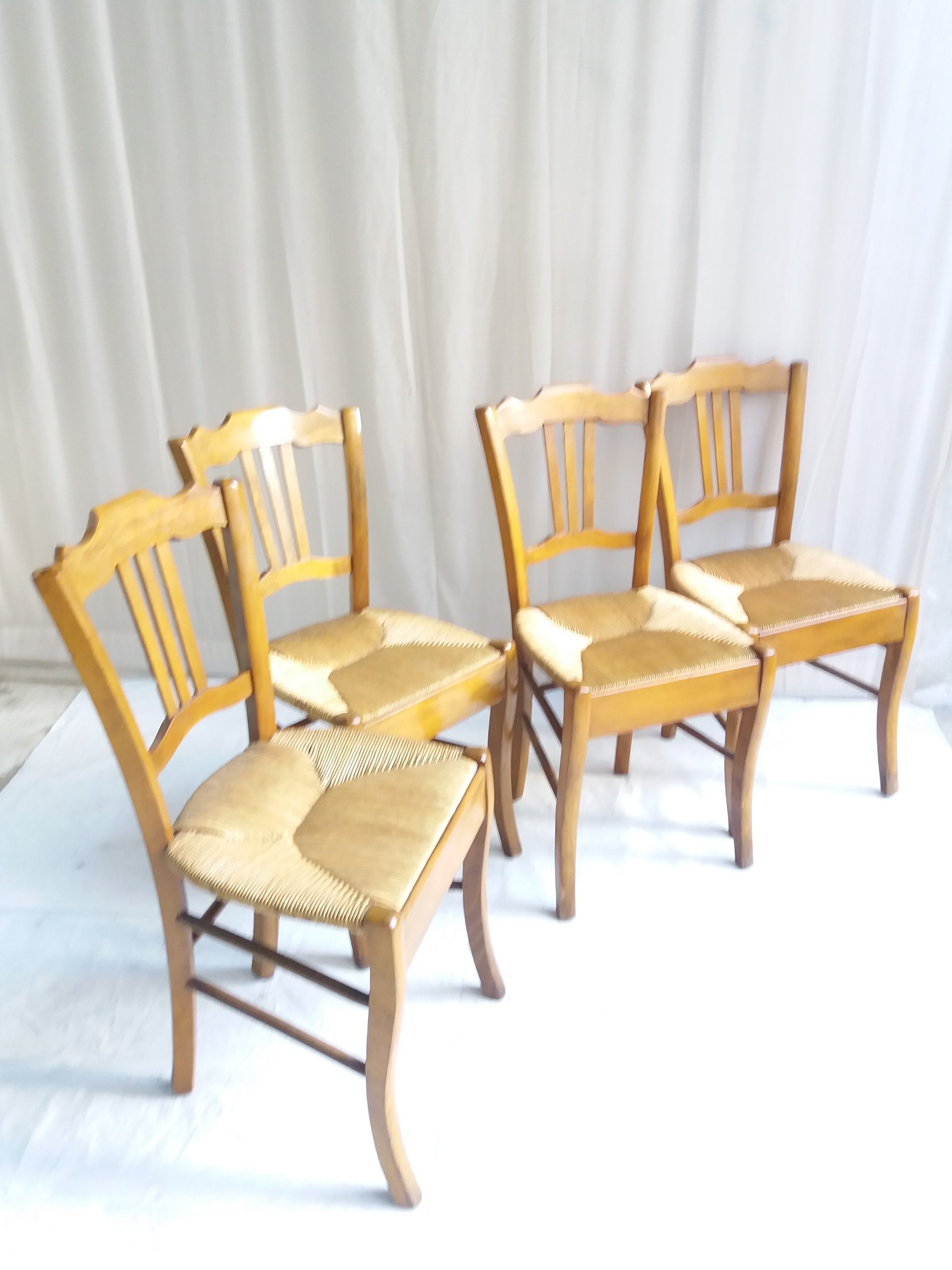 Series of 4 old mulched chairs