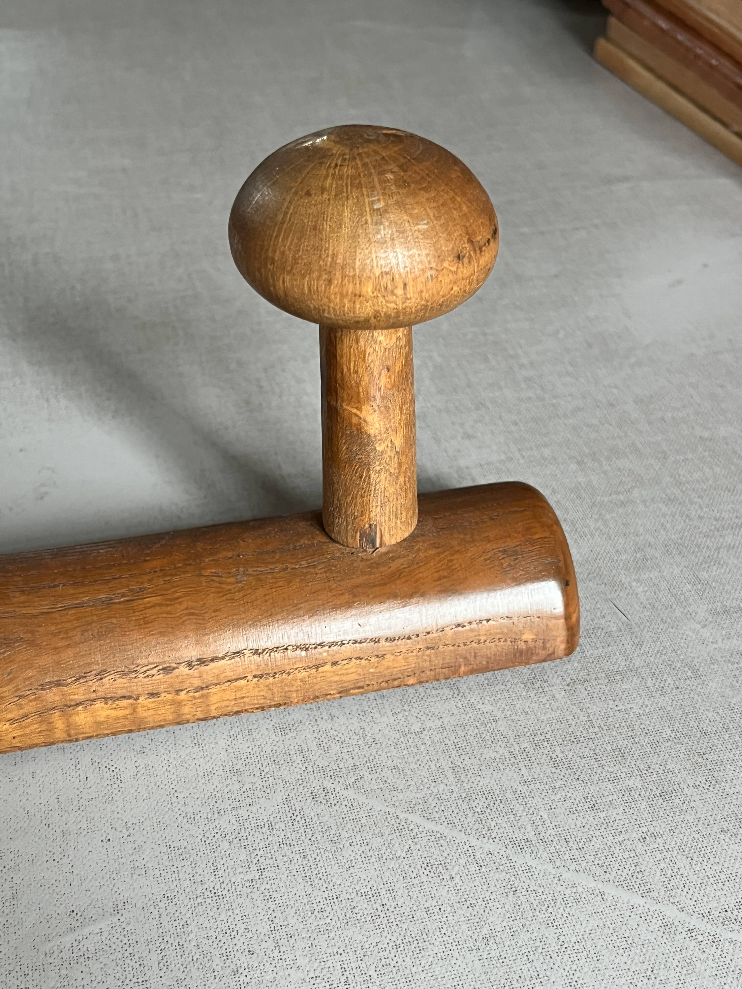 Varnished wooden wall coat rack with 4 hooks, antique item.