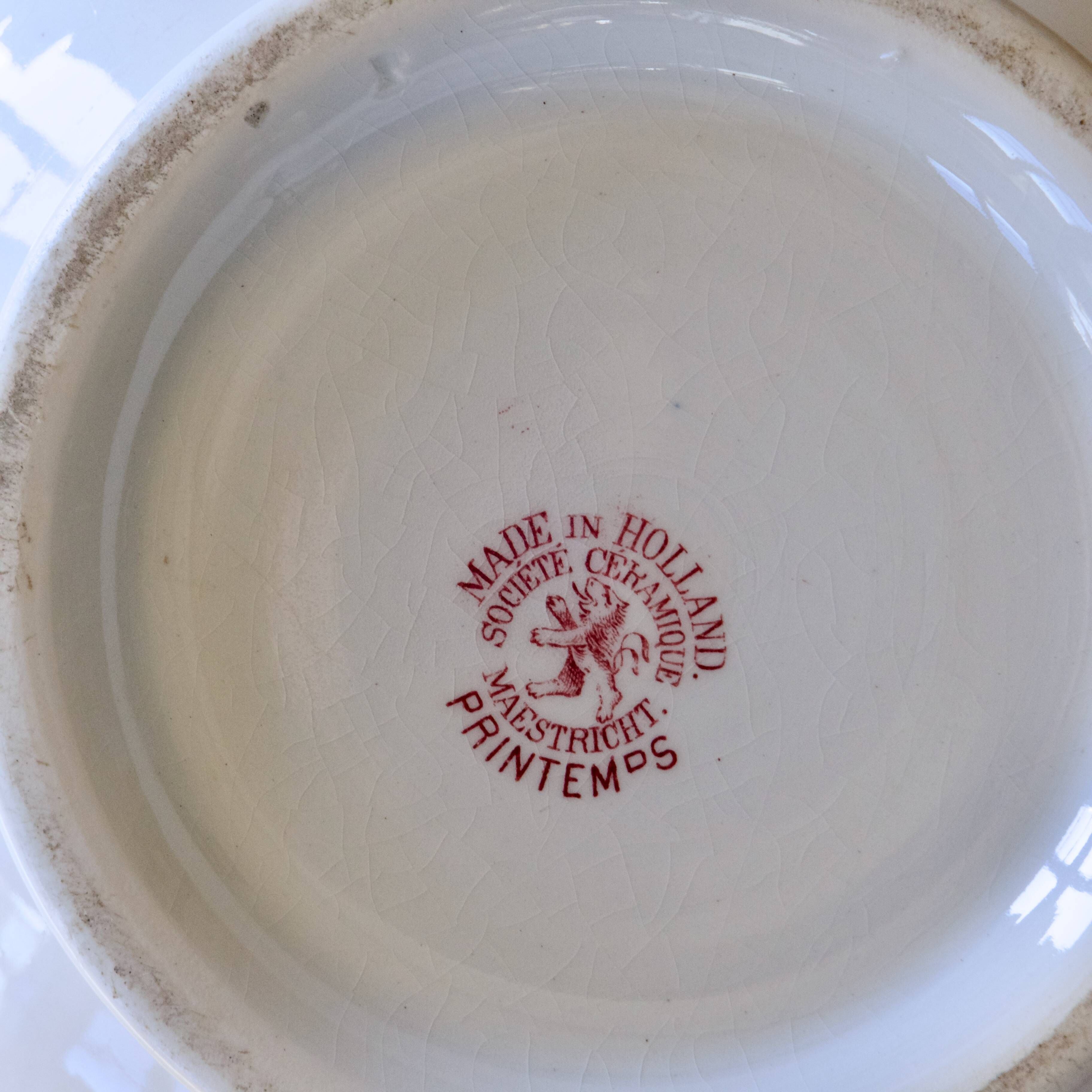Large 19th-century earthenware vase signed Maestricht, Spring collection.