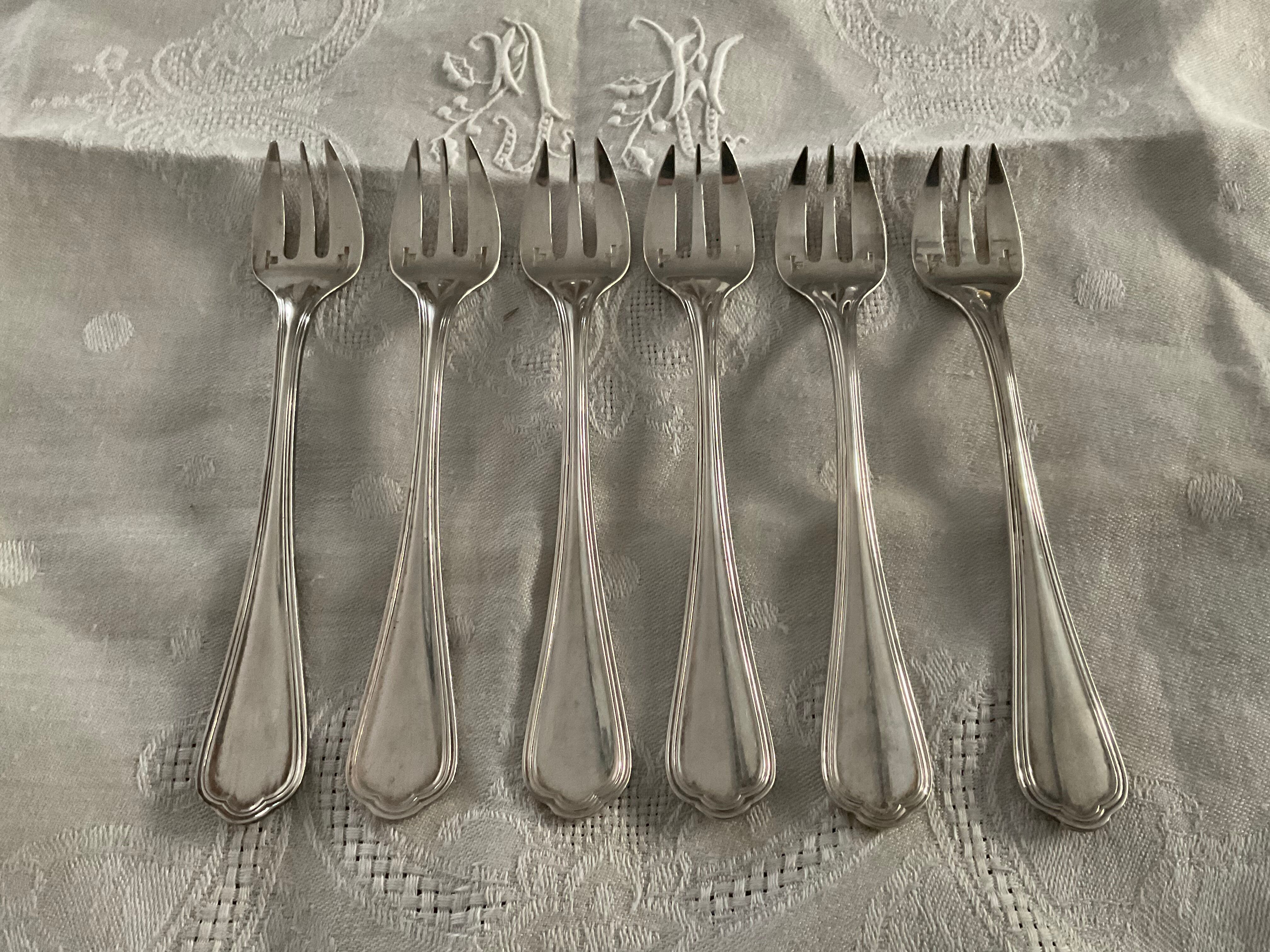 6 oyster forks. Christofle . Spatours