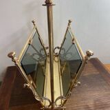 Brass magazine rack and blue-tinted glasses, 1950s.