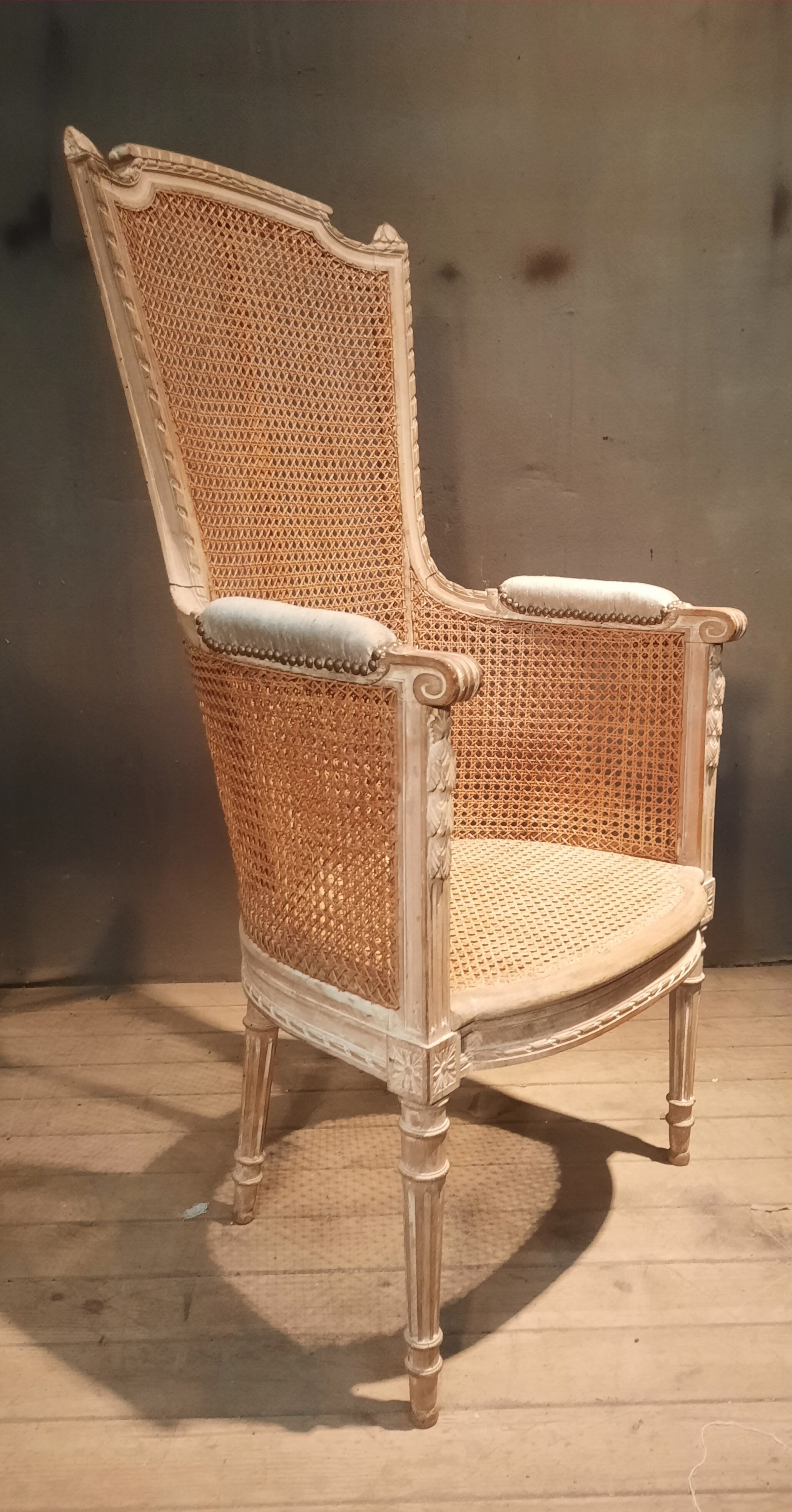 Louis XVI high-backed caned armchair