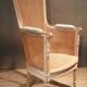 Louis XVI high-backed caned armchair