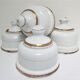 Four white enamelled metal cheese bells early twentieth century