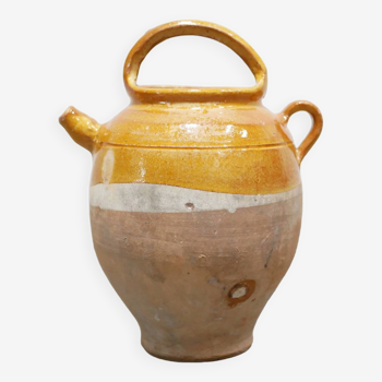 Old gargoulette pot in glazed terracotta