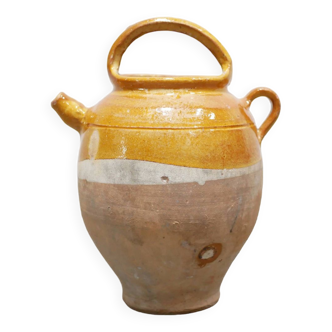 Old gargoulette pot in glazed terracotta