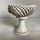 Braided ceramic ring pocket emptier