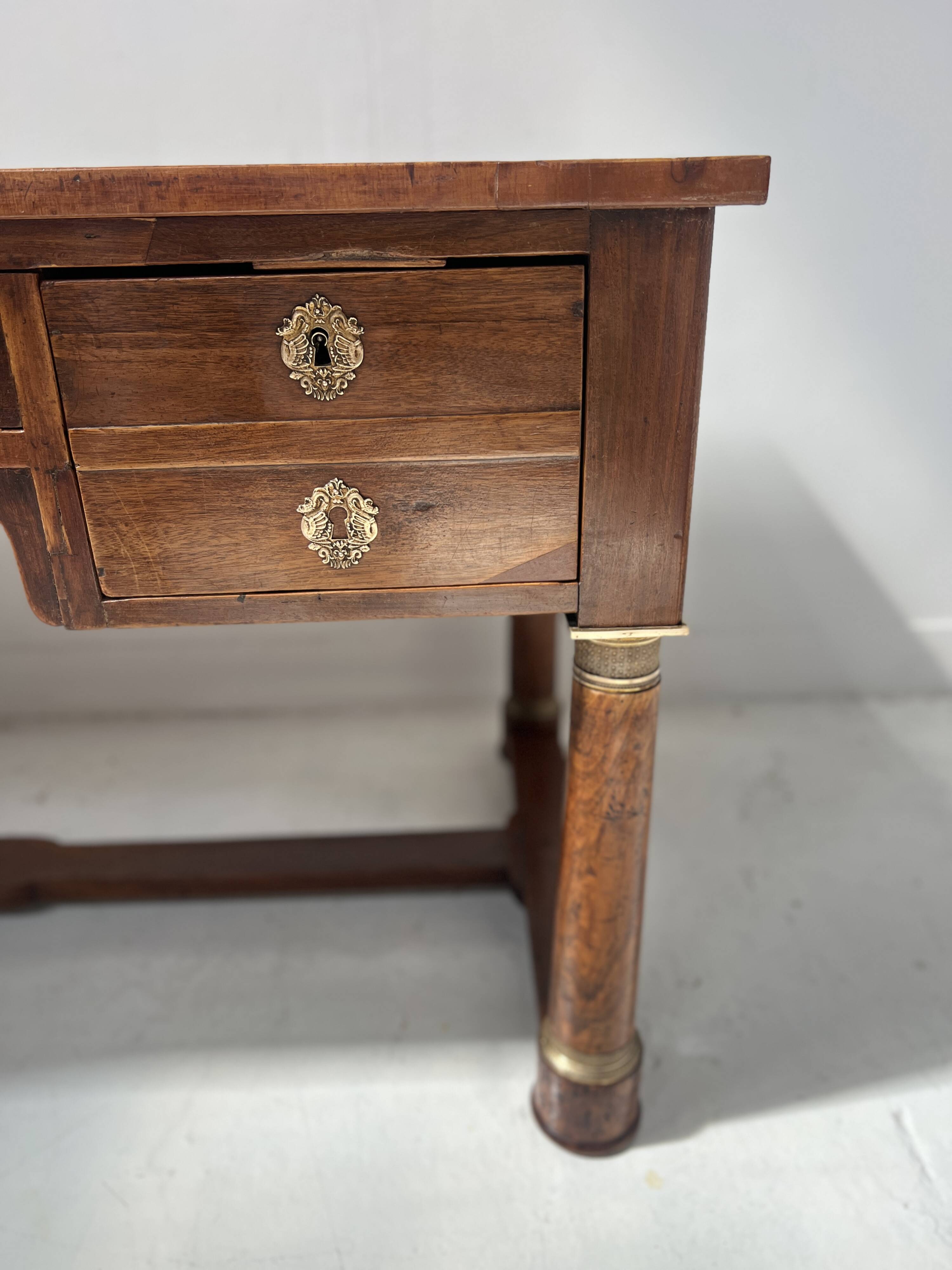 Empire style desk in mahogany and veneer, 19th century.