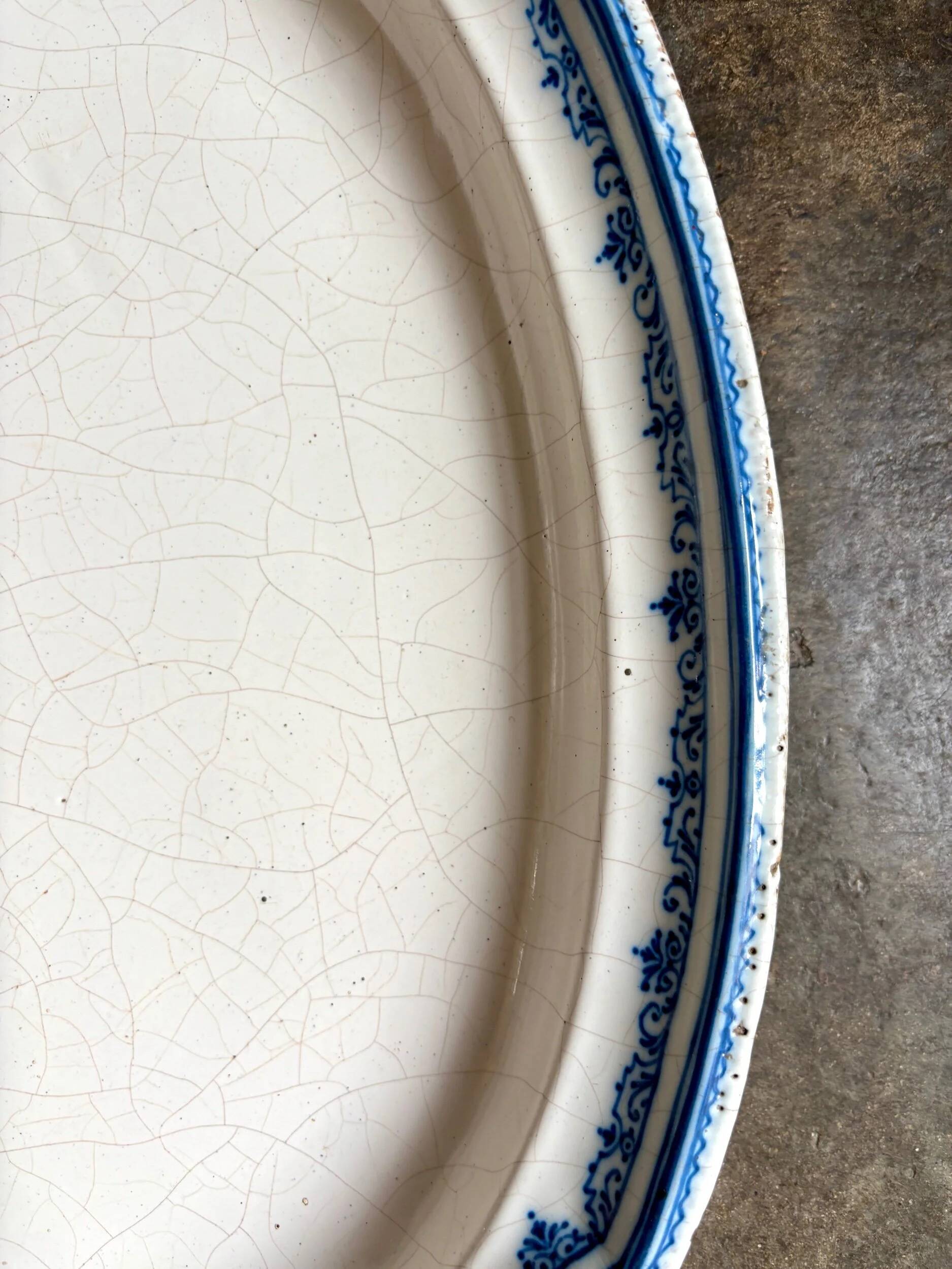 Moustiers hollow oval dish in glazed earthenware