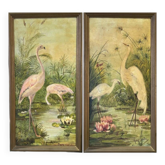 Pair of oil on panel depicting wading birds signed Raymonde.
