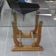 Art Deco coffee table in glass, wood, and brass.
