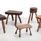 French brutalist tree trunk stools