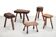 French brutalist tree trunk stools