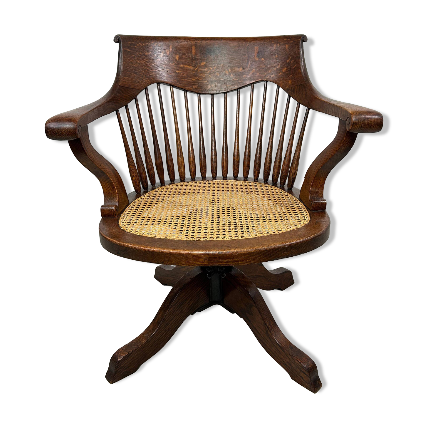 Swivel office chair in oak with a rattan seat.