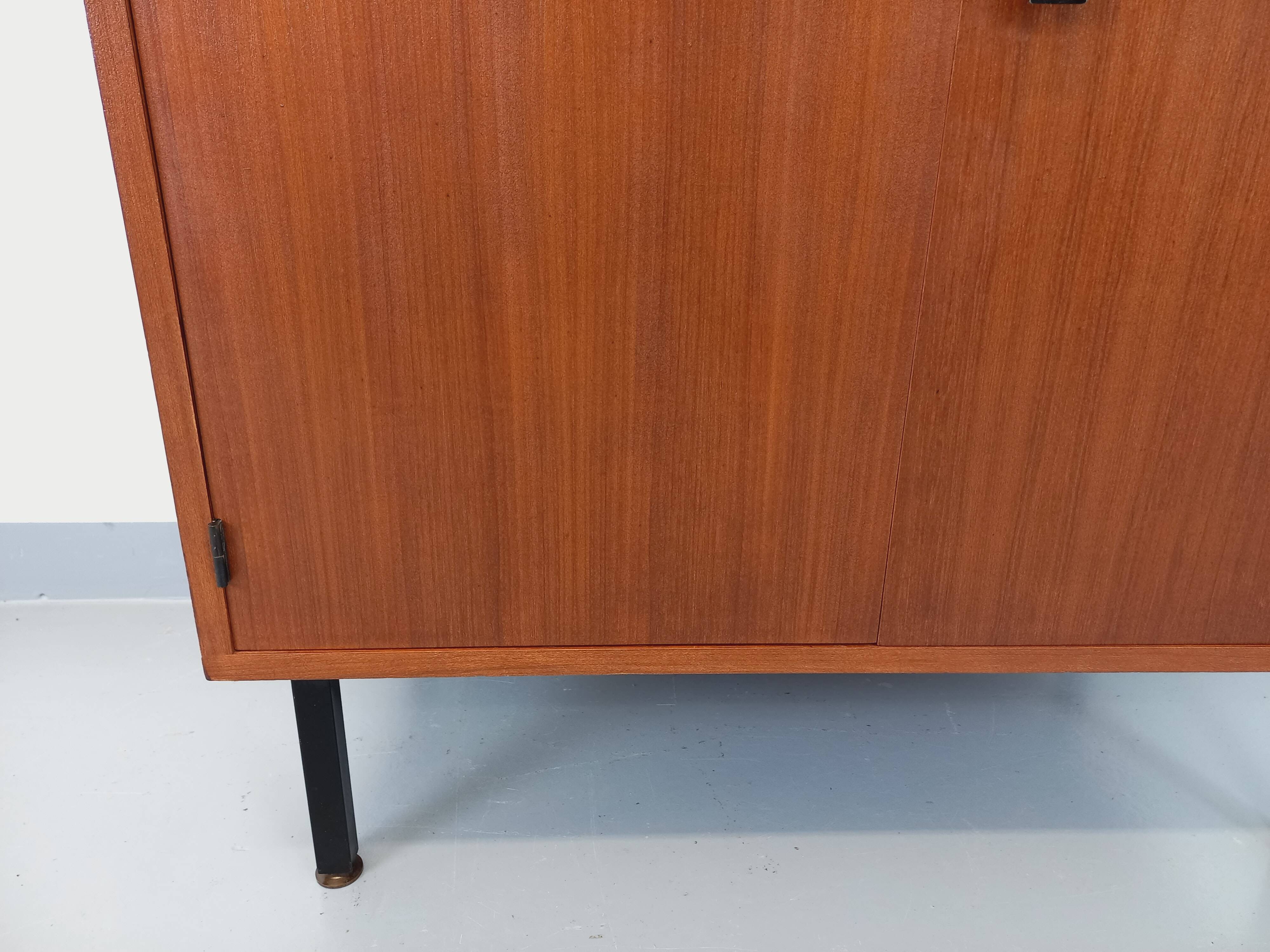 Small vintage storage unit in modernist Scandinavian style in teak from the 60s
