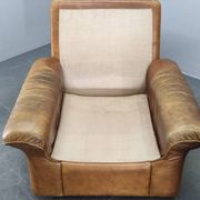 Paire de fauteuils lounge en cuir buffle cognac Arcon Italia