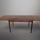 Scandinavian extendable dining table in teak