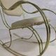 60s rocking chair in brass and ecru imitation leather