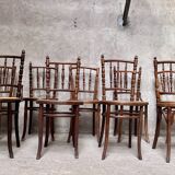 Series of 7 old bar cane cane bistro chairs