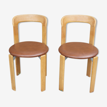 Paire de chaises du Designer Suisse Bruno Rey en bois et skaï marron