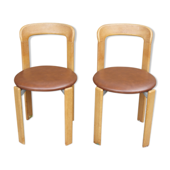 Paire de chaises du Designer Suisse Bruno Rey en bois et skaï marron