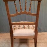Chaise basse tapissée