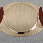 Plates and a brass and Bakelite cut by PM Italy, Italy around 1970.
