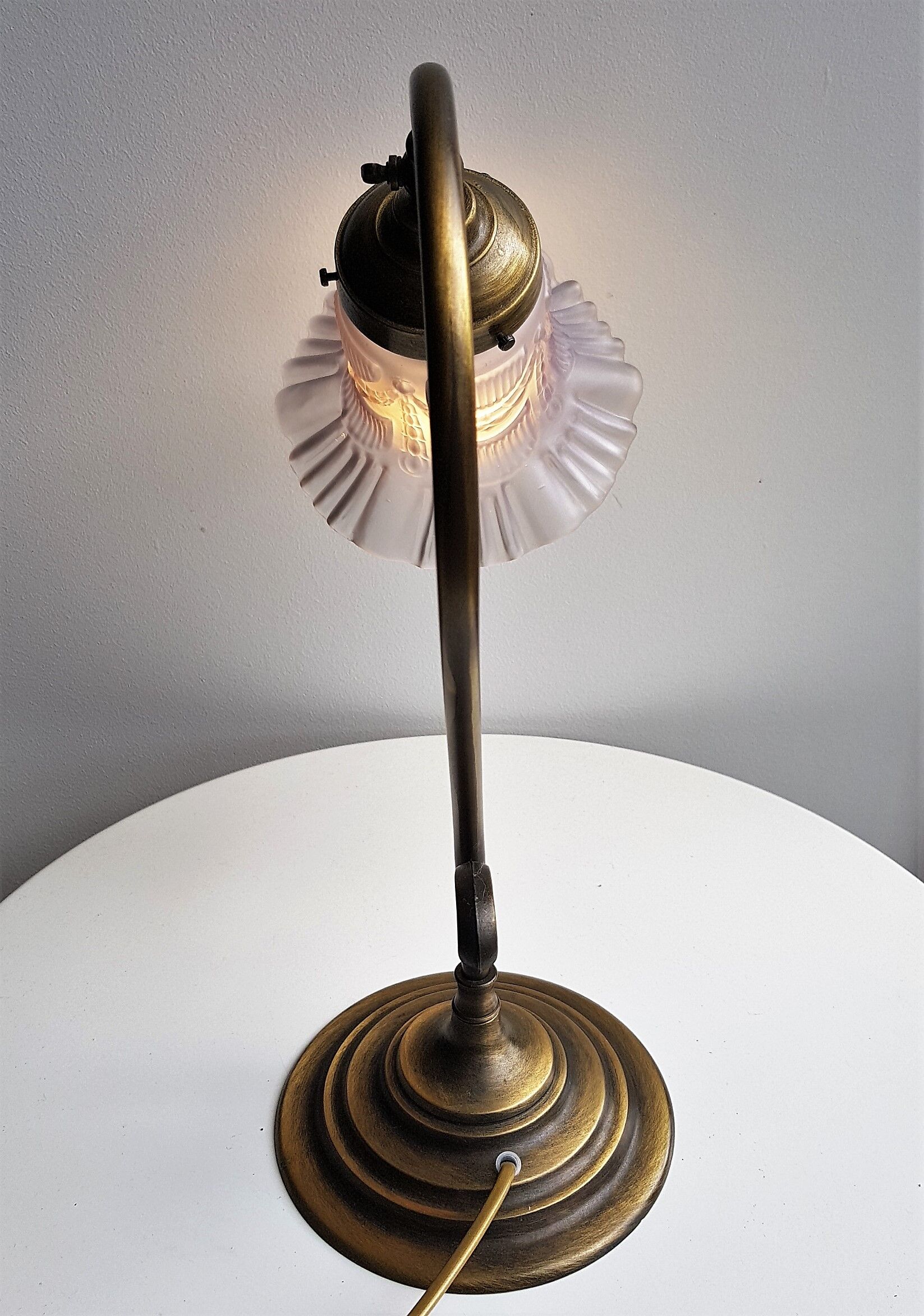 Articulated in brass and frosted glass lamp