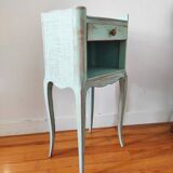 Patinated bedside table end of sofa