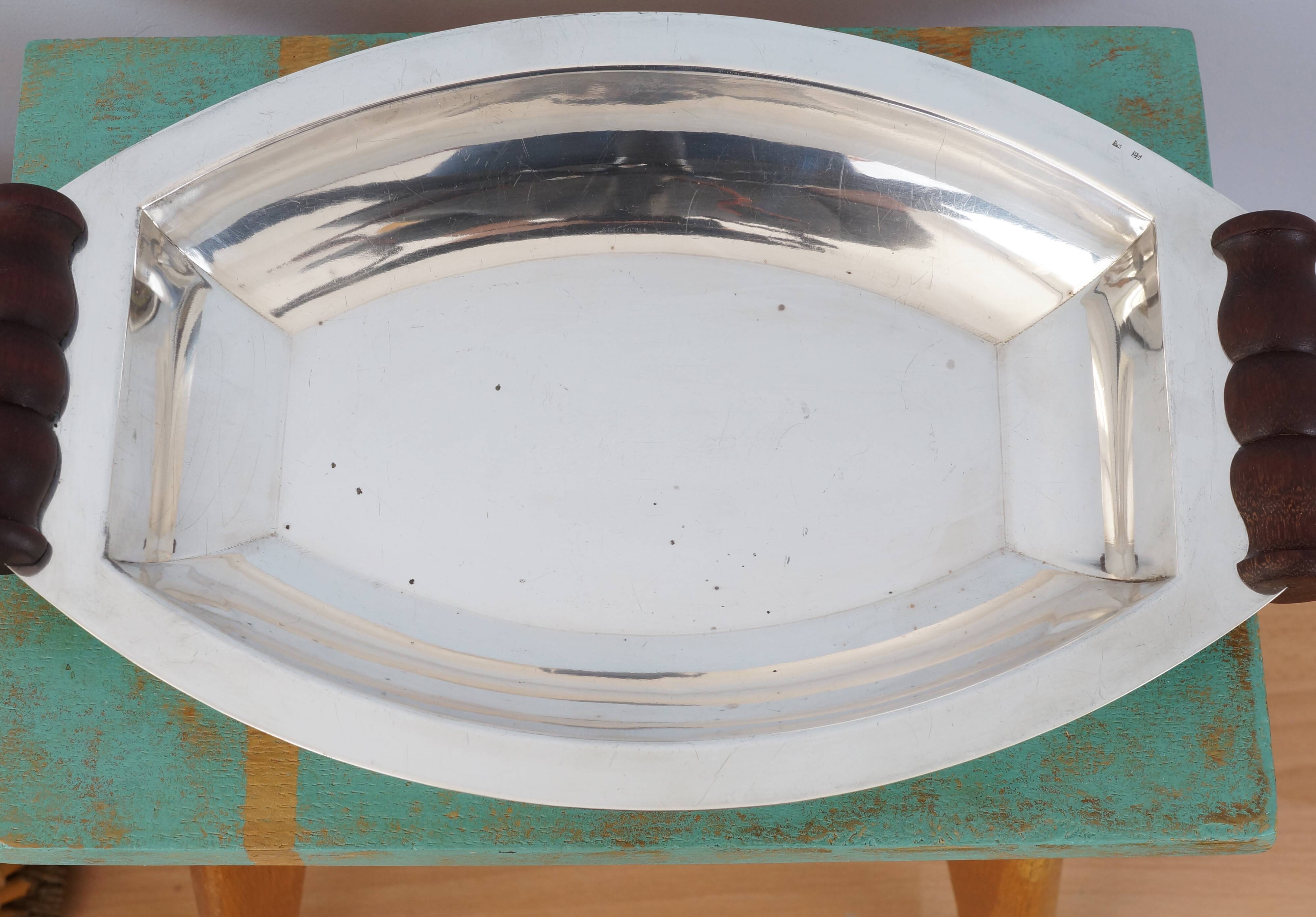 Silver plated metal hollow dish and mahogany handles