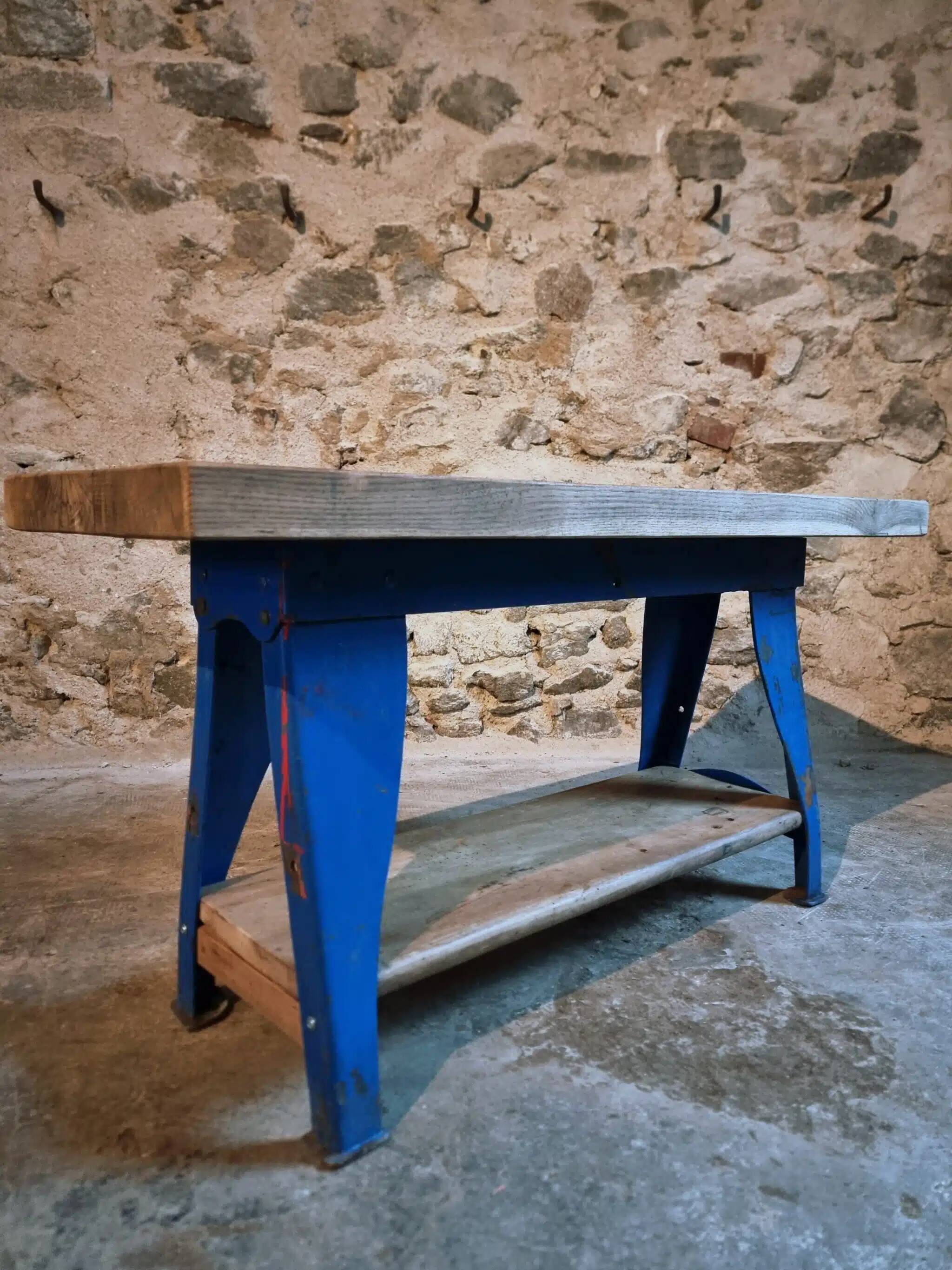 Vintage industrial workbench table with cast iron legs (Aux Forges de Vulcain)
