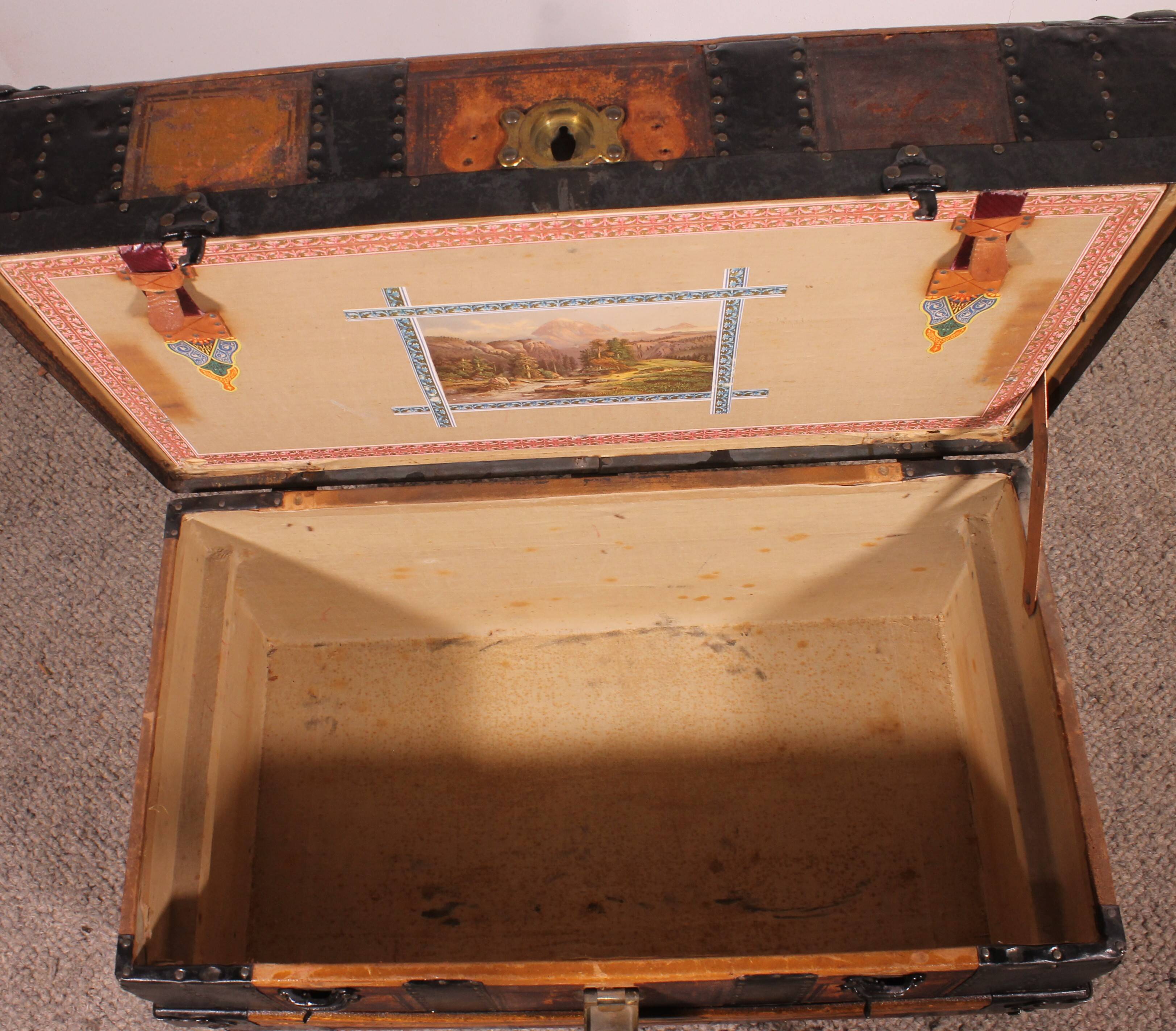 travel trunk from the early 20th century made of leather and wood