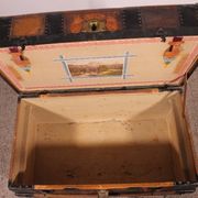 travel trunk from the early 20th century made of leather and wood