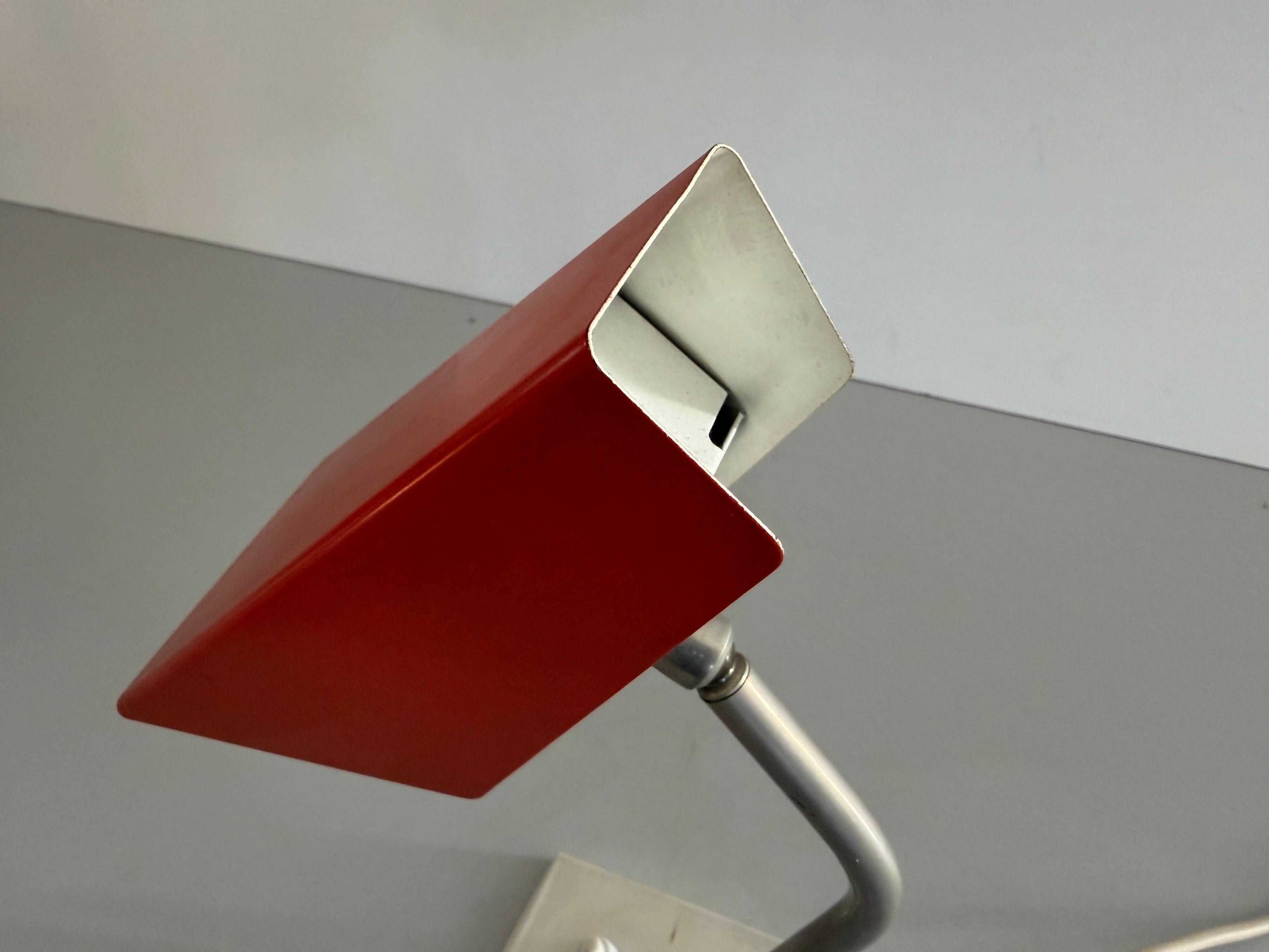 Table lamp with a red metal head, 1960, Germany