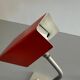 Table lamp with a red metal head, 1960, Germany