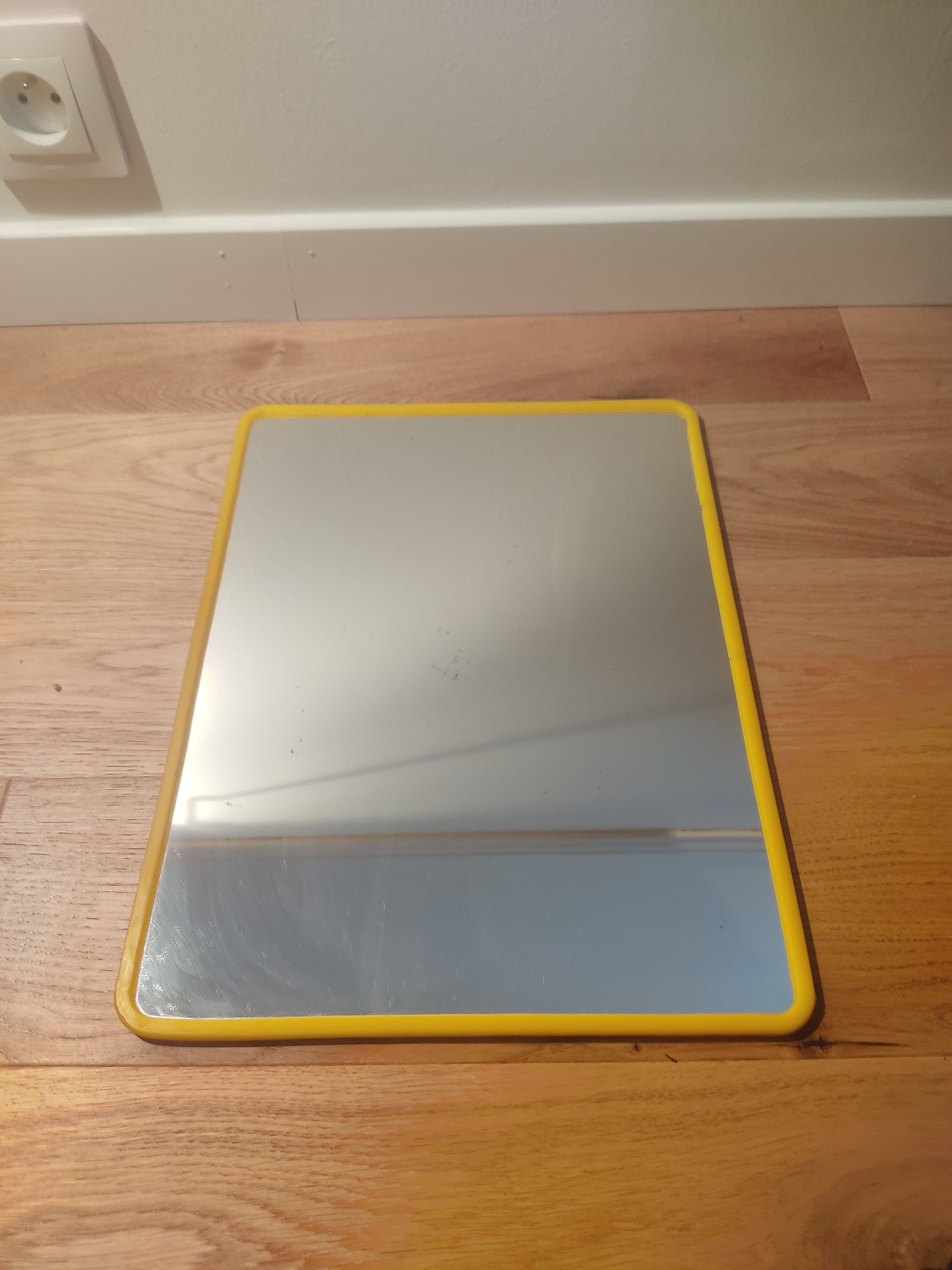 Mirror 70s yellow plastic rounded shape