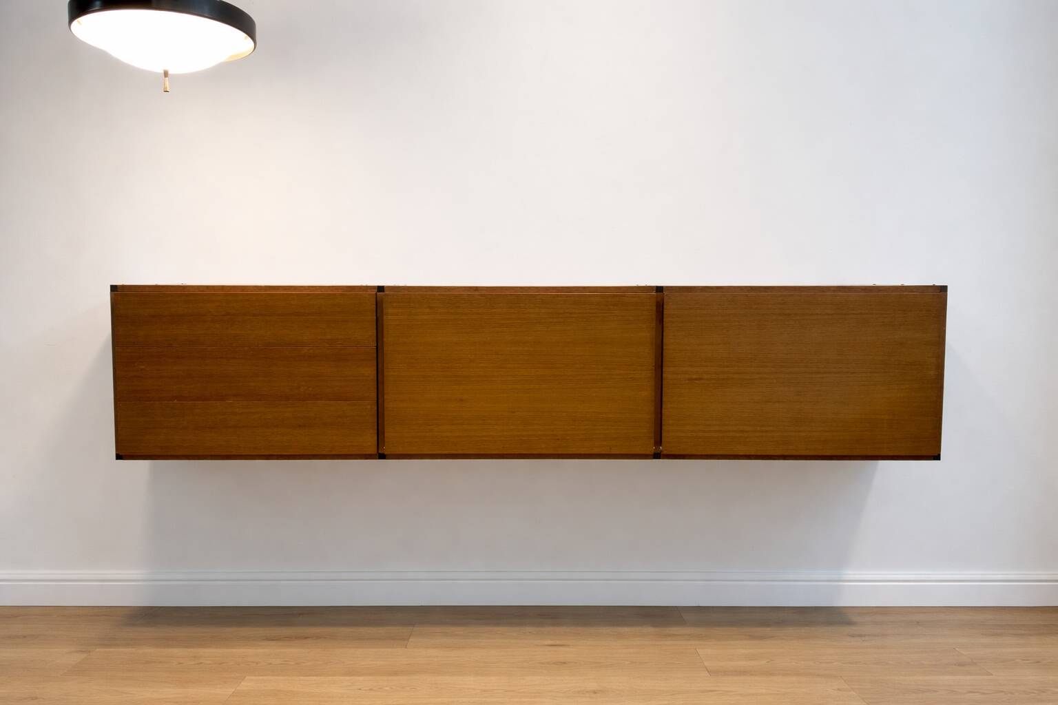 Immense teak library wall