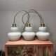 Lot de trois suspensions scandinaves en opaline blanche