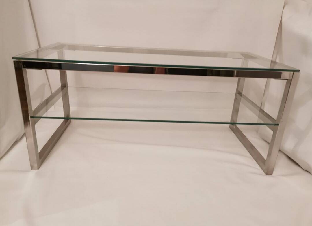 1980s coffee table with a double chrome metal top.