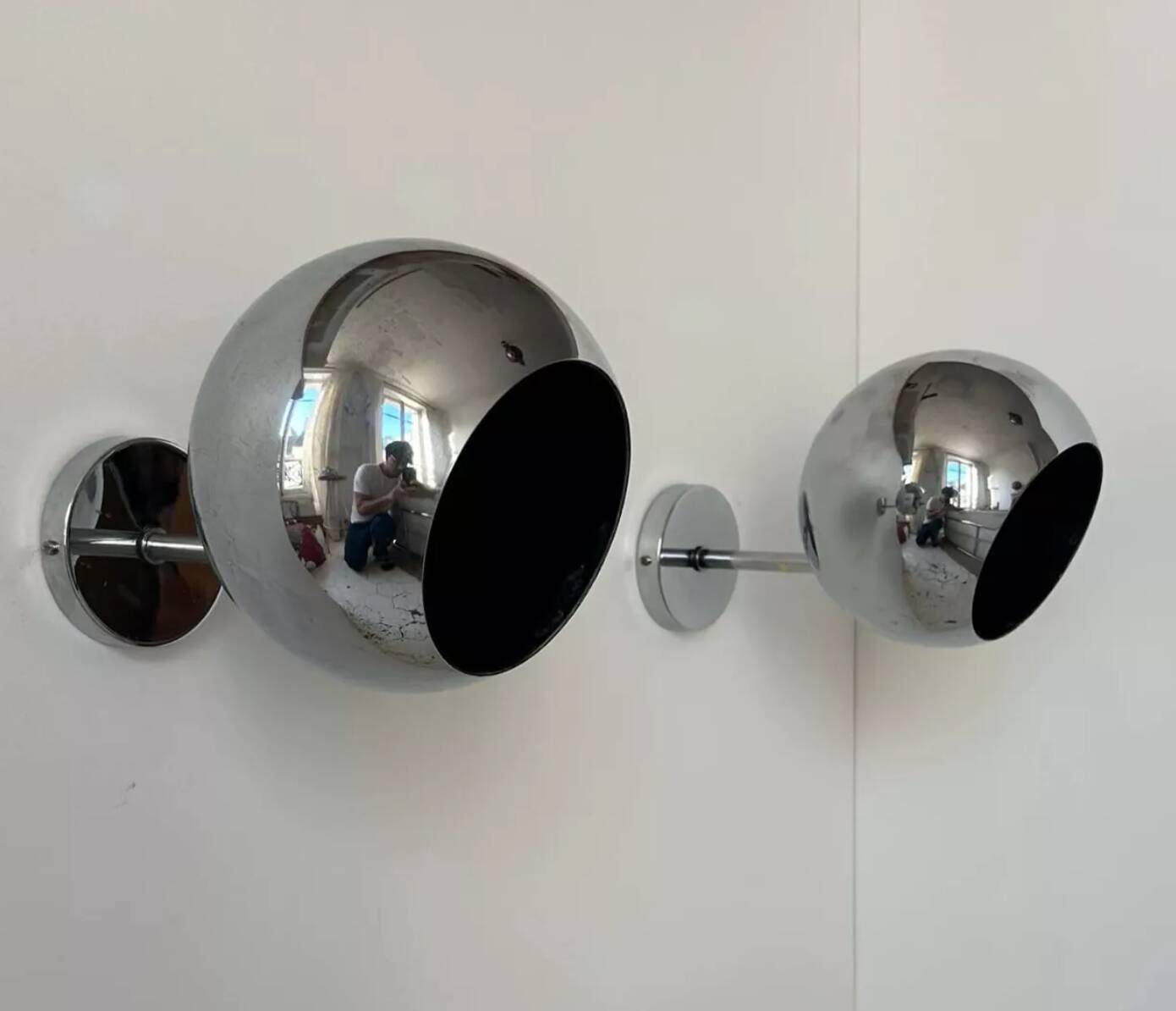 Pair of adjustable wall lights, chromed metal, France 1970