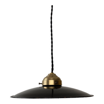Old black enamelled industrial suspension