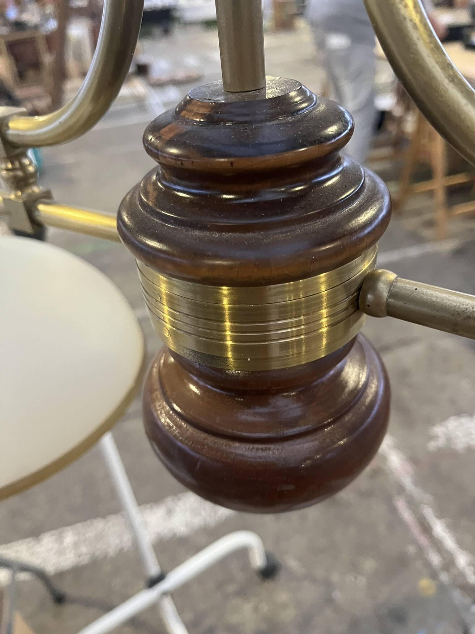 Vintage chandelier in wood and brass