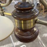 Vintage chandelier in wood and brass