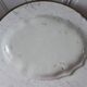 Plat oval terre de fer début XXe